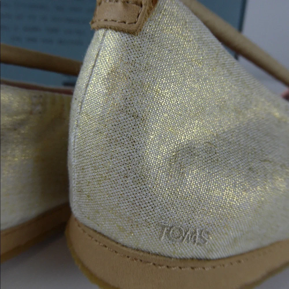 Toms Metallic Cream Slip-On Flats